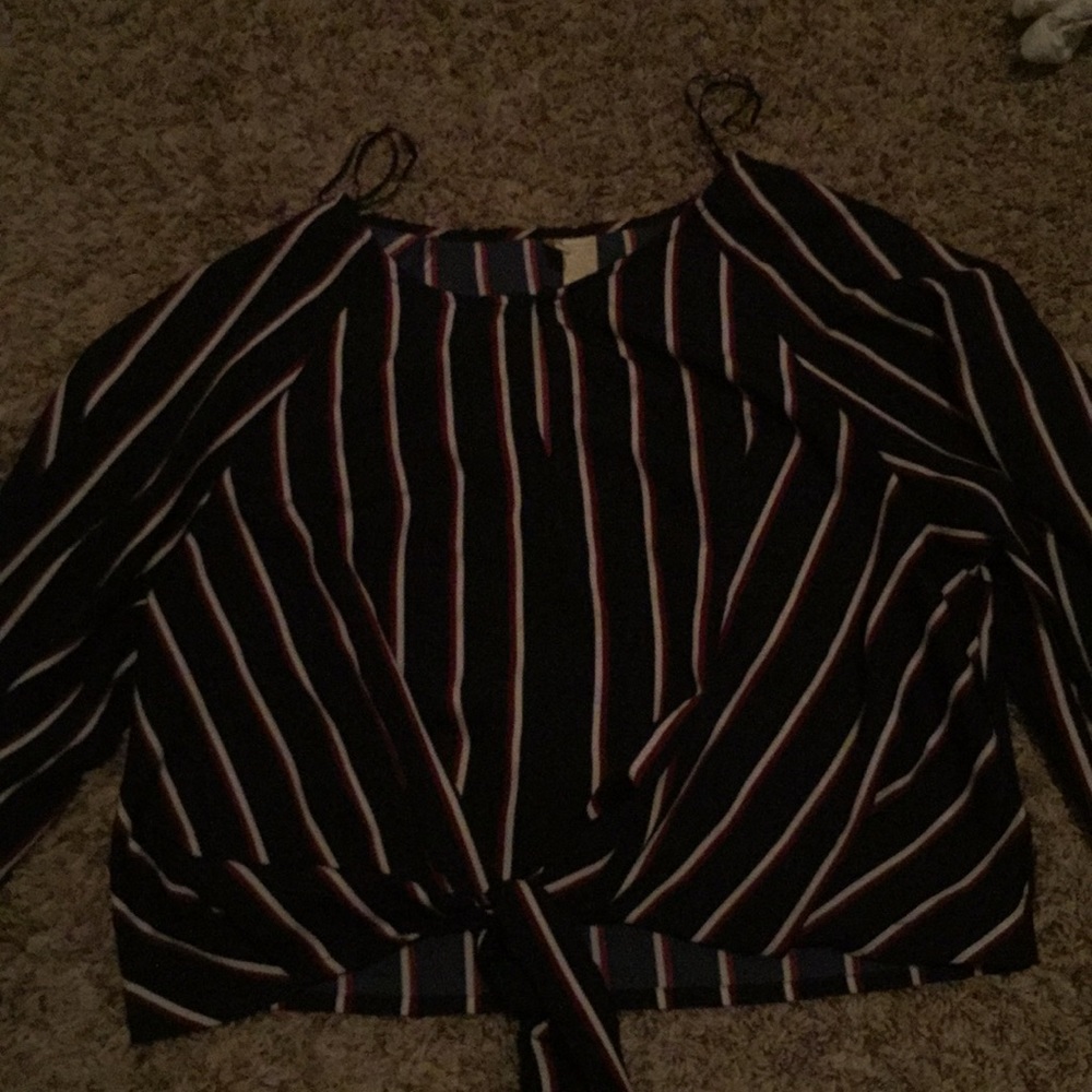 a white maroon and blue dress up shirt